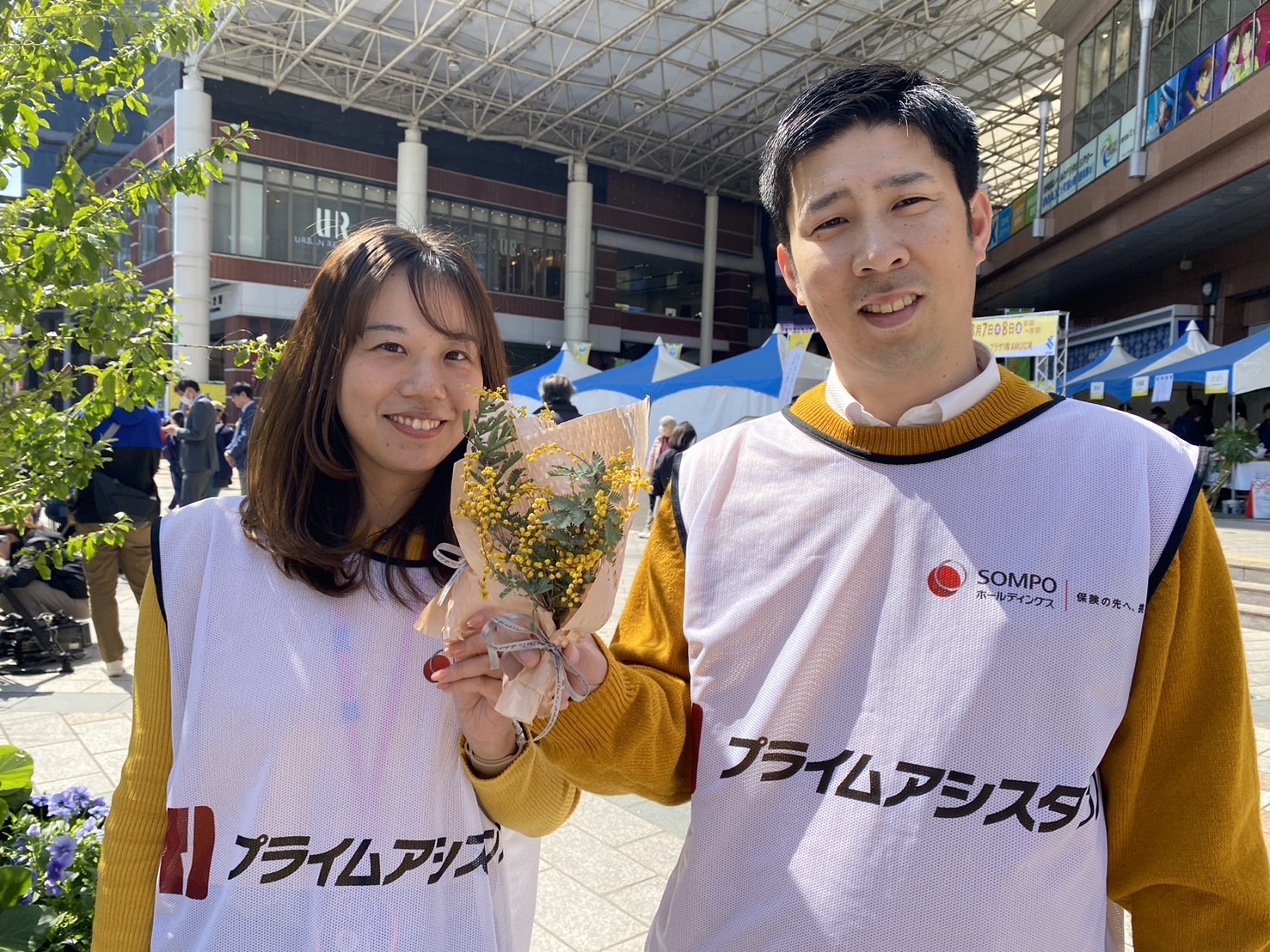 国際女性デーにおけるミモザミニブーケ配布イベント協賛および参加